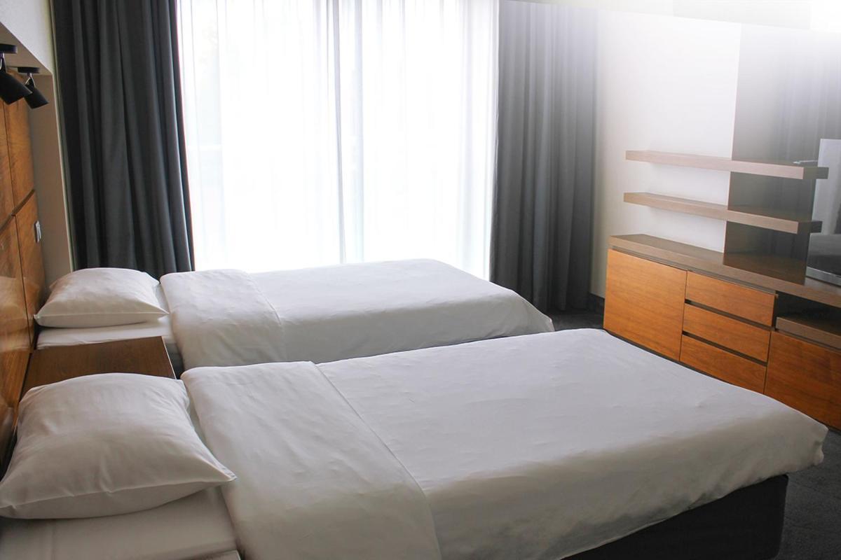 Willa Port Art&Business Ostróda Exterior foto A bedroom at the hotel